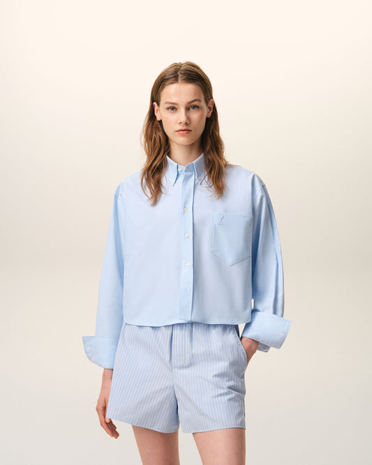 Blue cropped cotton shirt with embossed Ami de Coeur